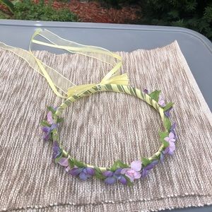 flower crown purple flowers and yellow ribbon